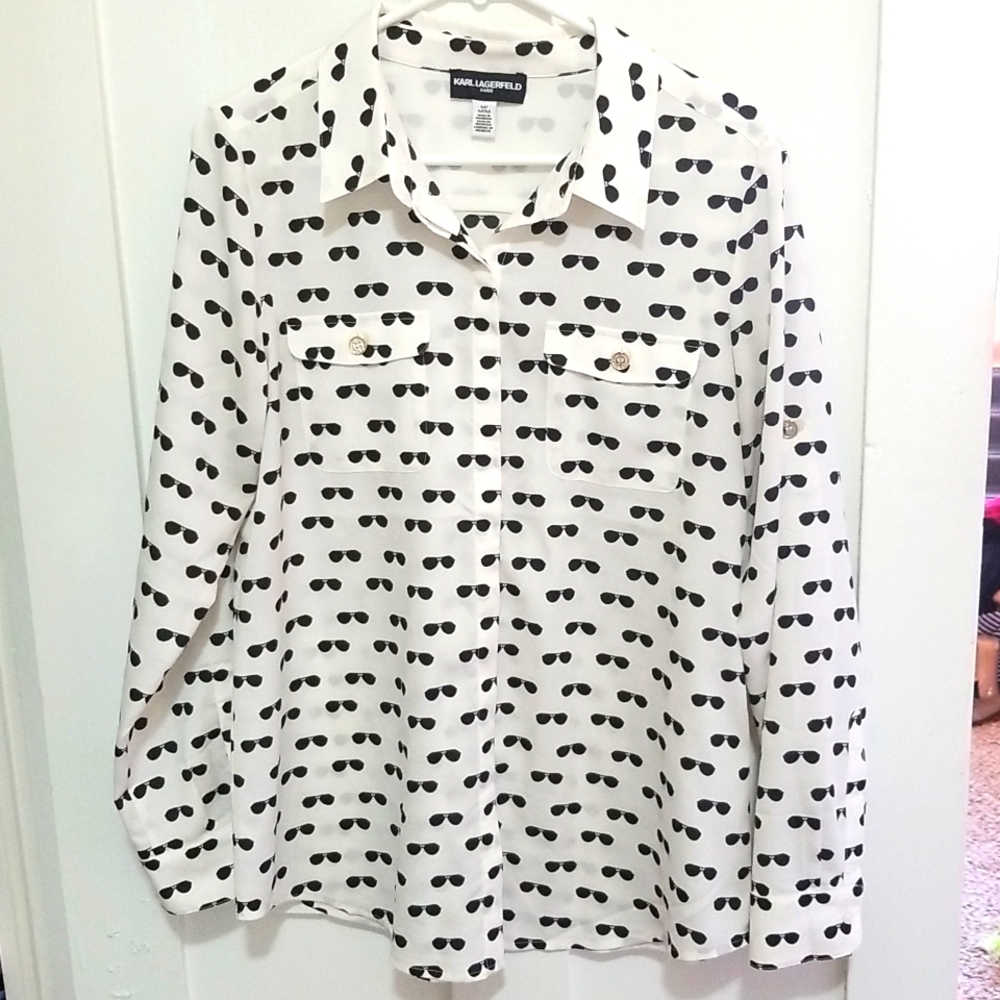 Cream button down blouse with sunglasses pattern